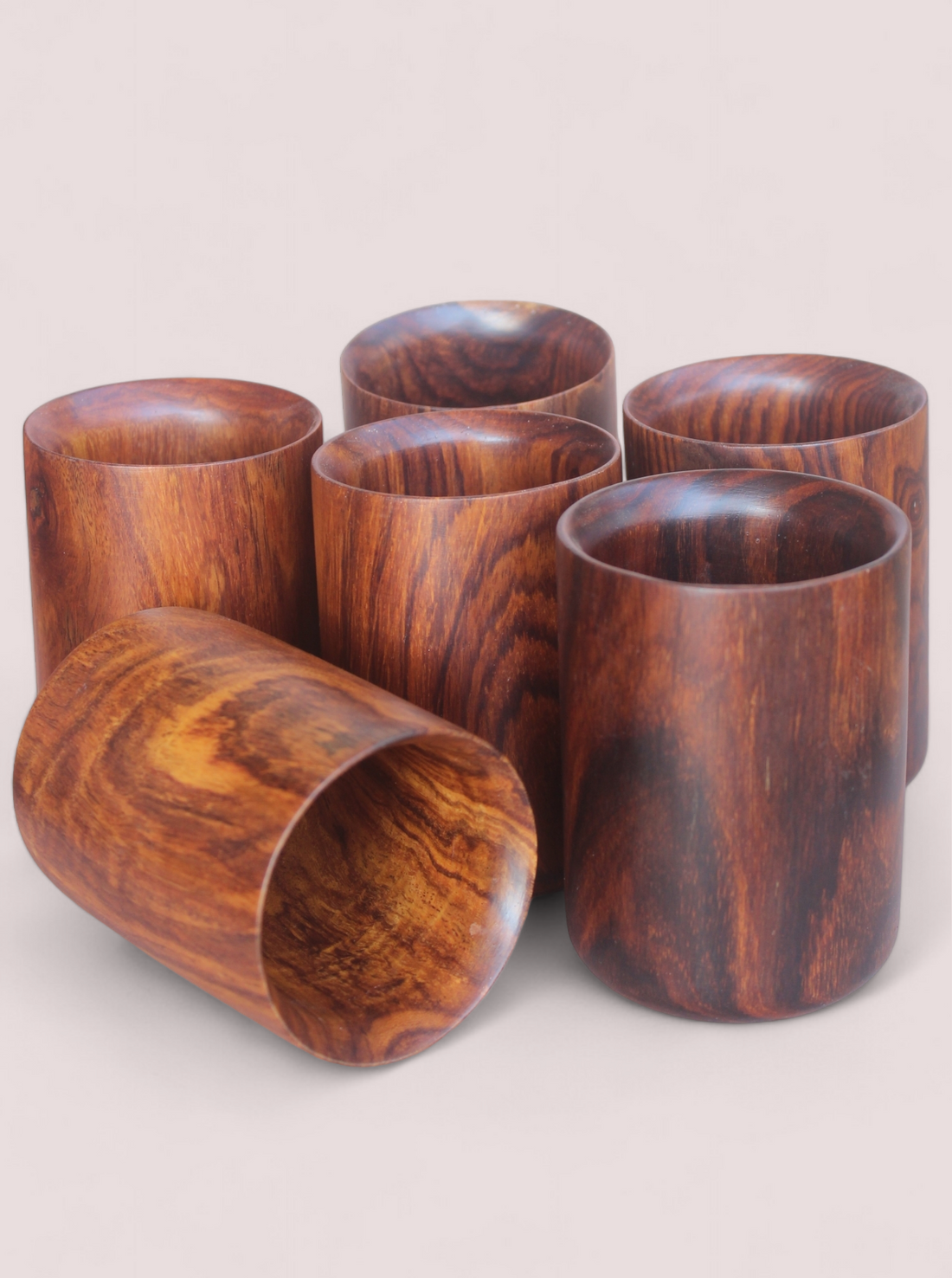 Handcrafted wooden drinking glasses made out of teak wood with a food-grade finish